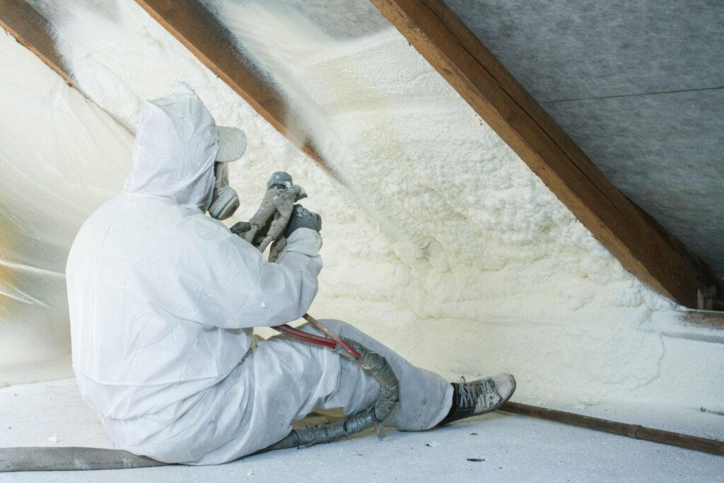 Are You Throwing Money Out the Window? Discover How Spray Foam Cuts Energy  Costs – Top Insulation Contractors